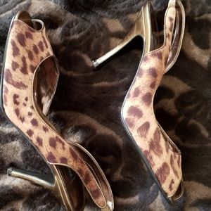 Leopard print peep toe pumps